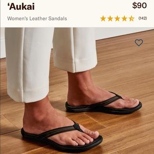 Olukai black flip flops